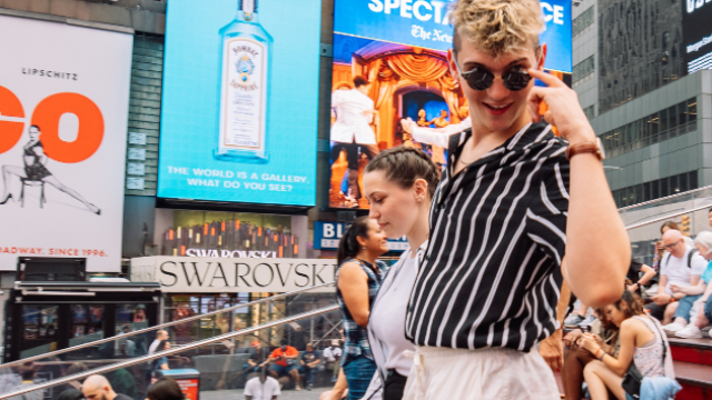 male au pair on the steps in new york city