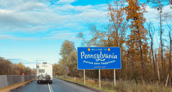 welcome to pa road sign on the highway