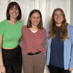 three women next to each other smiling